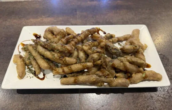 Palitos de berenjena crujientes con miel de caña